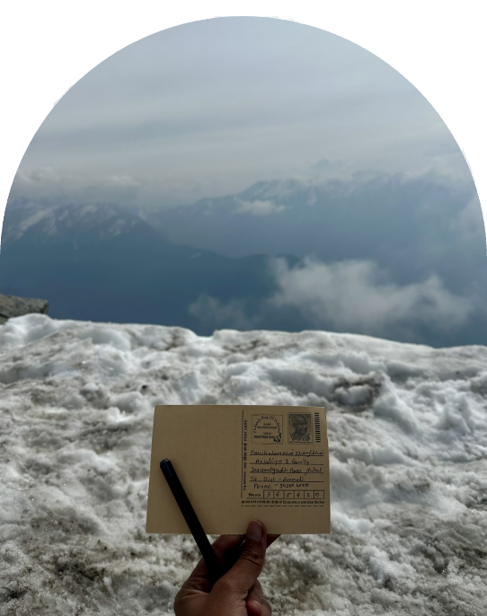 Writing a Postcard at the Summit