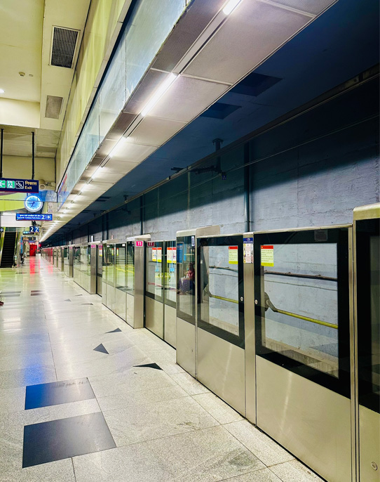 Inside Delhi Metro—swift moments through the city before escaping into the mountains