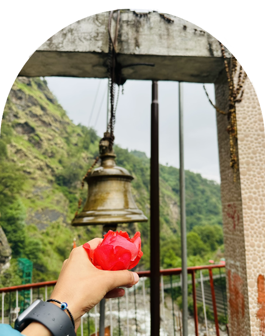 Kalpeshwar Temple surrounded by lush greenery and towering cliffs—a hidden spiritual gem on the Panch Kedar trail