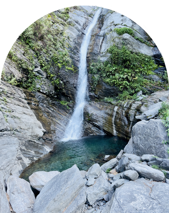 Glistening waterfall cascading along the Madhyamaheshwar trail—refreshing pause in nature’s untouched sanctuary