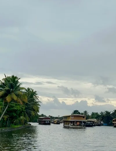 A traditional Kerala houseboat floating on Alleppey backwaters