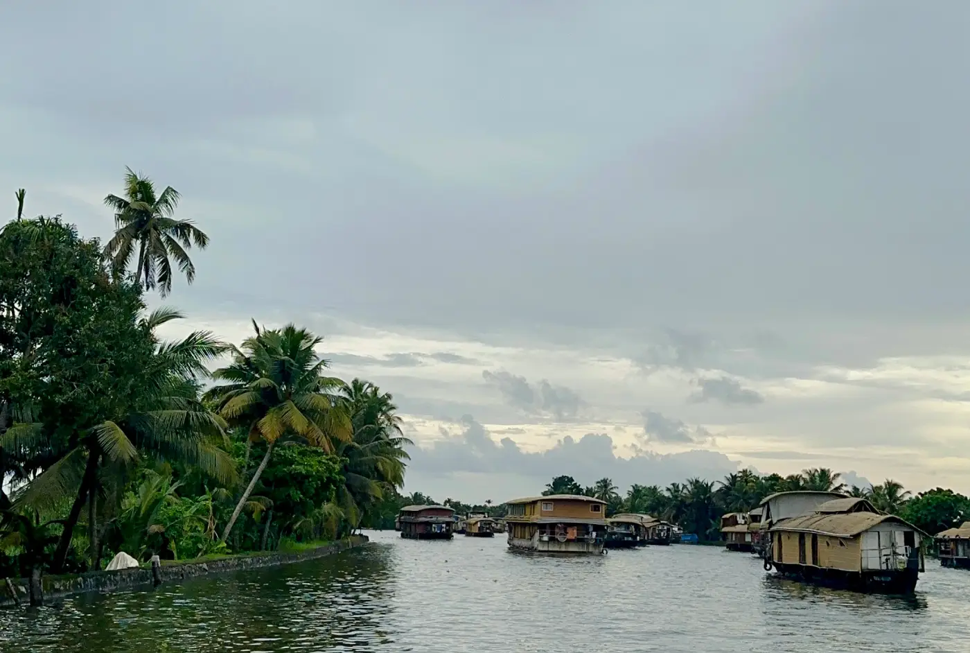 A traditional Kerala houseboat floating on Alleppey backwaters