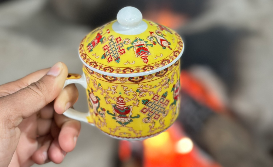 Warm milk tea served in traditional mountain kitchen