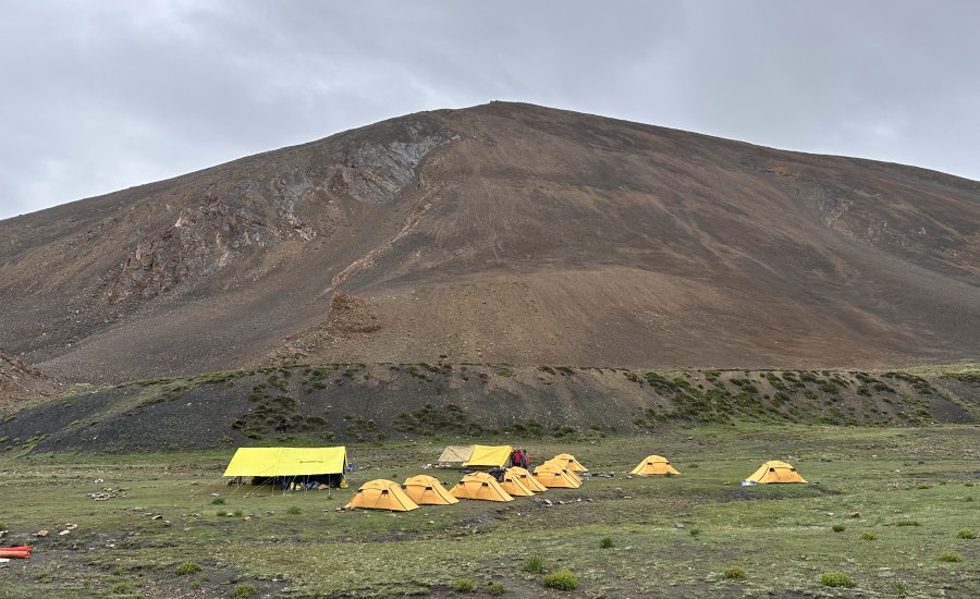 Kanamo Base Camp campsite surrounded by the mountains