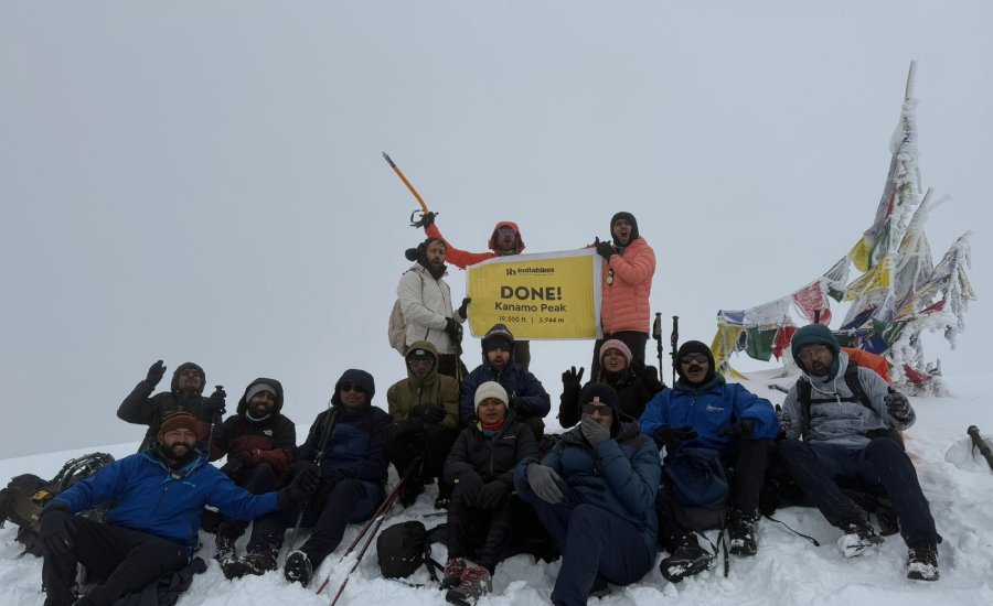 Standing on the summit of Kanamo Peak at 19,553 feet