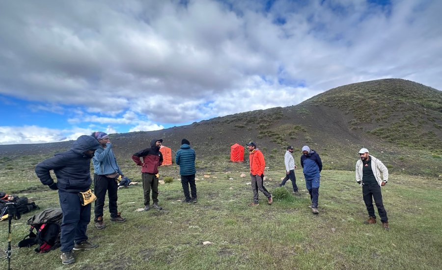 Trekkers playing Ziguja before leaving Kanamo Base Camp